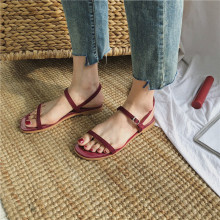 Sandals women's 2019 summer new Korean version versatile student flat bottom open toe hollow one word buckle