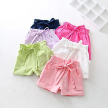 Package mail summer new girls' candy color cotton hemp big pocket elastic waist High Waist Shorts